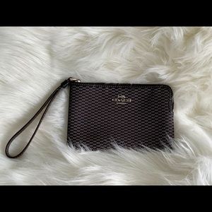 Wristlet clutch by Coach-casual and classy.
